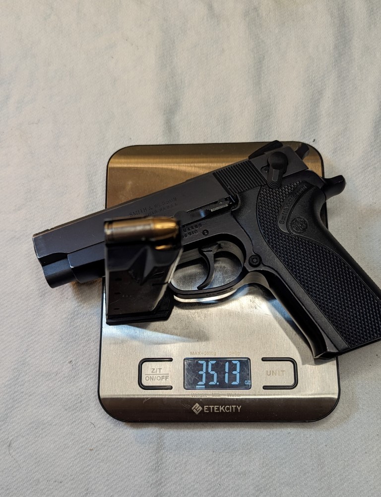 Smith & Wesson 910, 35 oz. loaded